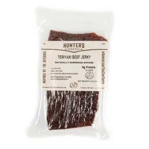 Hunters Reserve All Natural Teriyaki Beef Jerky 2 Oz | Marvelli Artisan Breads Packaged teriyaki beef jerky in a clear plastic pouch with a beige label that reads teriyaki beef jerky and brand hunters reserve